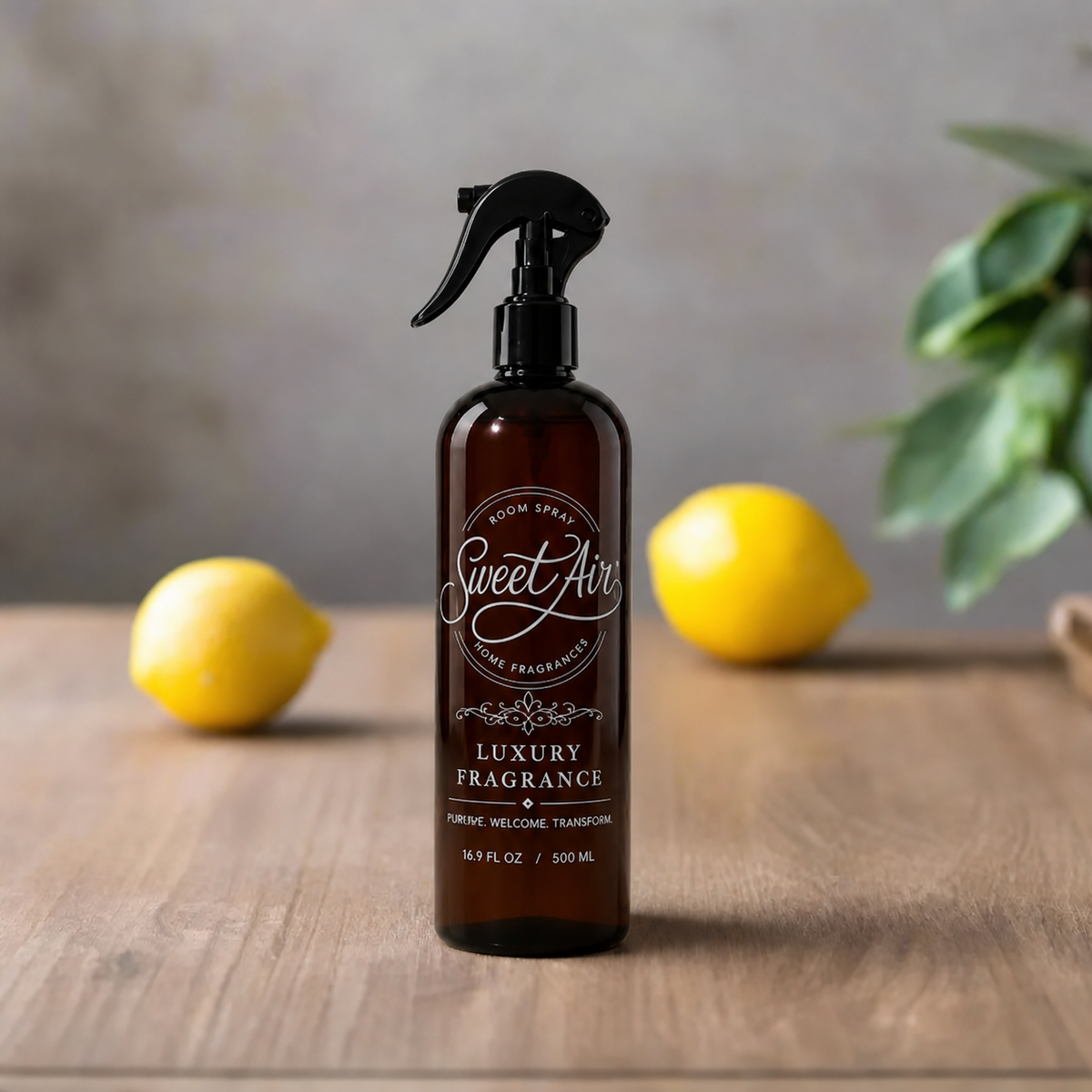 Filled Home Spray 16 oz / 500 ml bottle with lemons on a light background